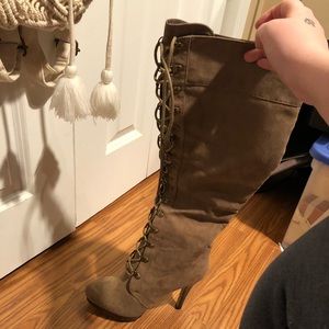 Knee high lace up boots
